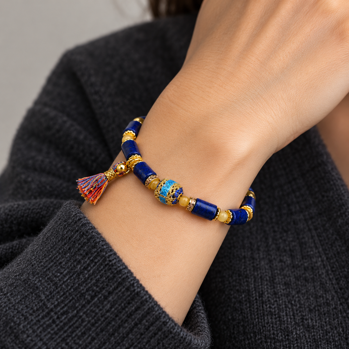 Close-up wrist view of blue bracelet