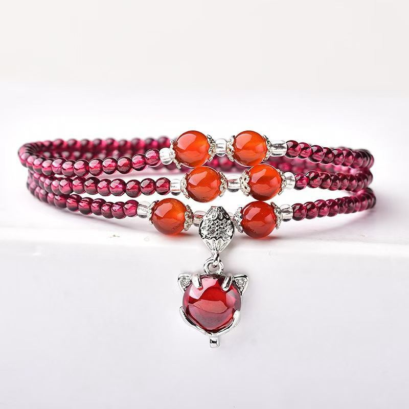 Original garnet triple-wrap bracelet with six accent beads and red fox charm