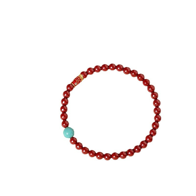 Full red koi bracelet with turquoise-colored bead
