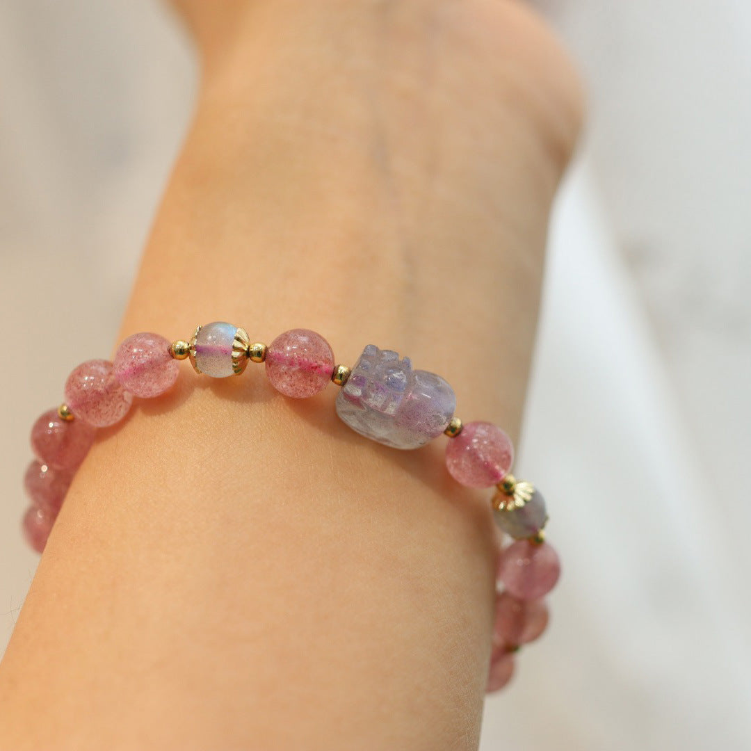 Strawberry quartz and moonstone Pixiu bracelet worn on wrist