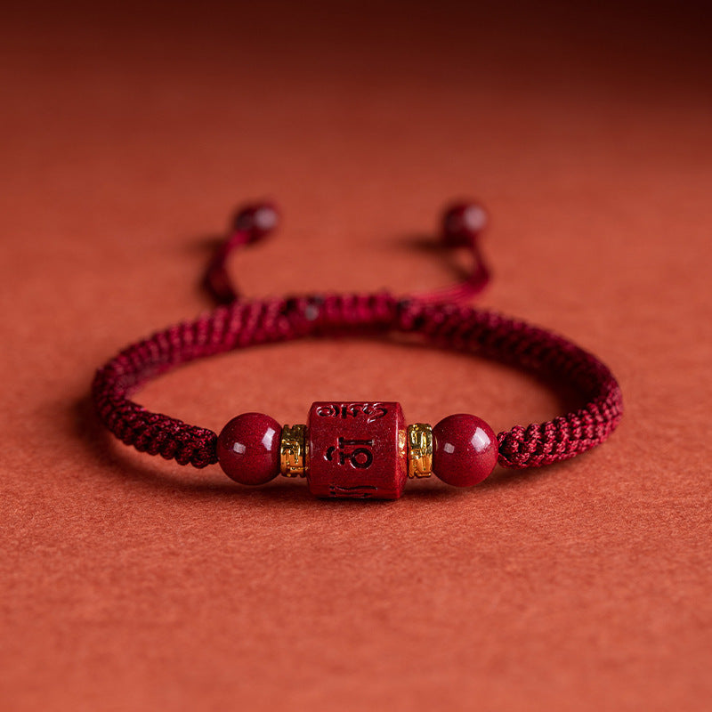 Adjustable burgundy cord cinnabar mantra bracelet