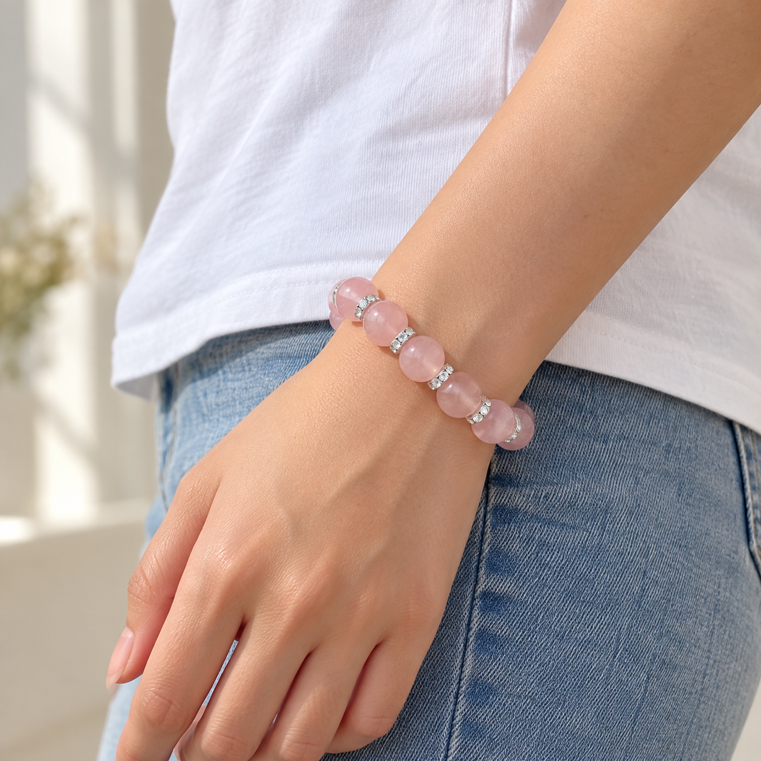 Side view of the blush pink bracelet worn on the wrist