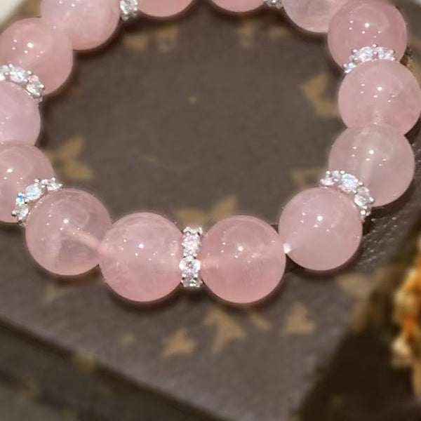 Close detail of pink beads and rhinestone spacers from the real product photo