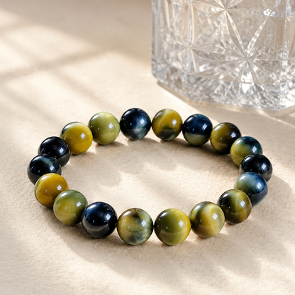 7A Blue Gold Tiger Eye Bracelet – Collector Grade – diagonal glass-bottle still life