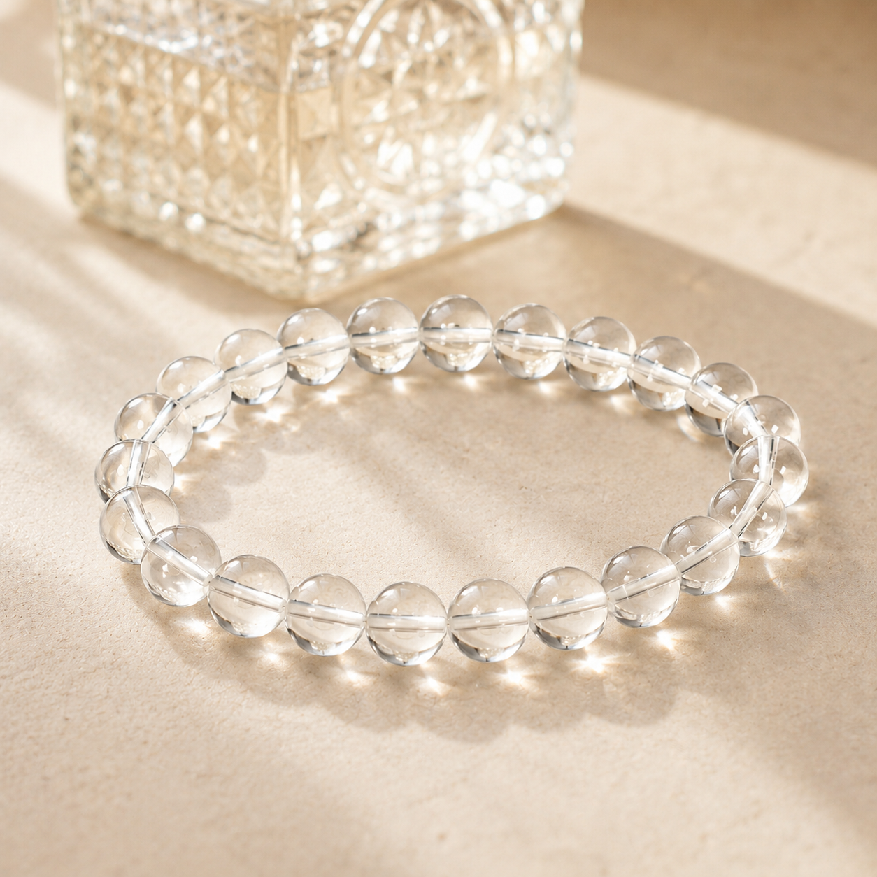 7A Natural Clear Quartz Bracelet – 8mm – diagonal glass-bottle still life