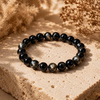 7A Silver Sheen Obsidian Bracelet – 8mm – travertine and dried-flower still life