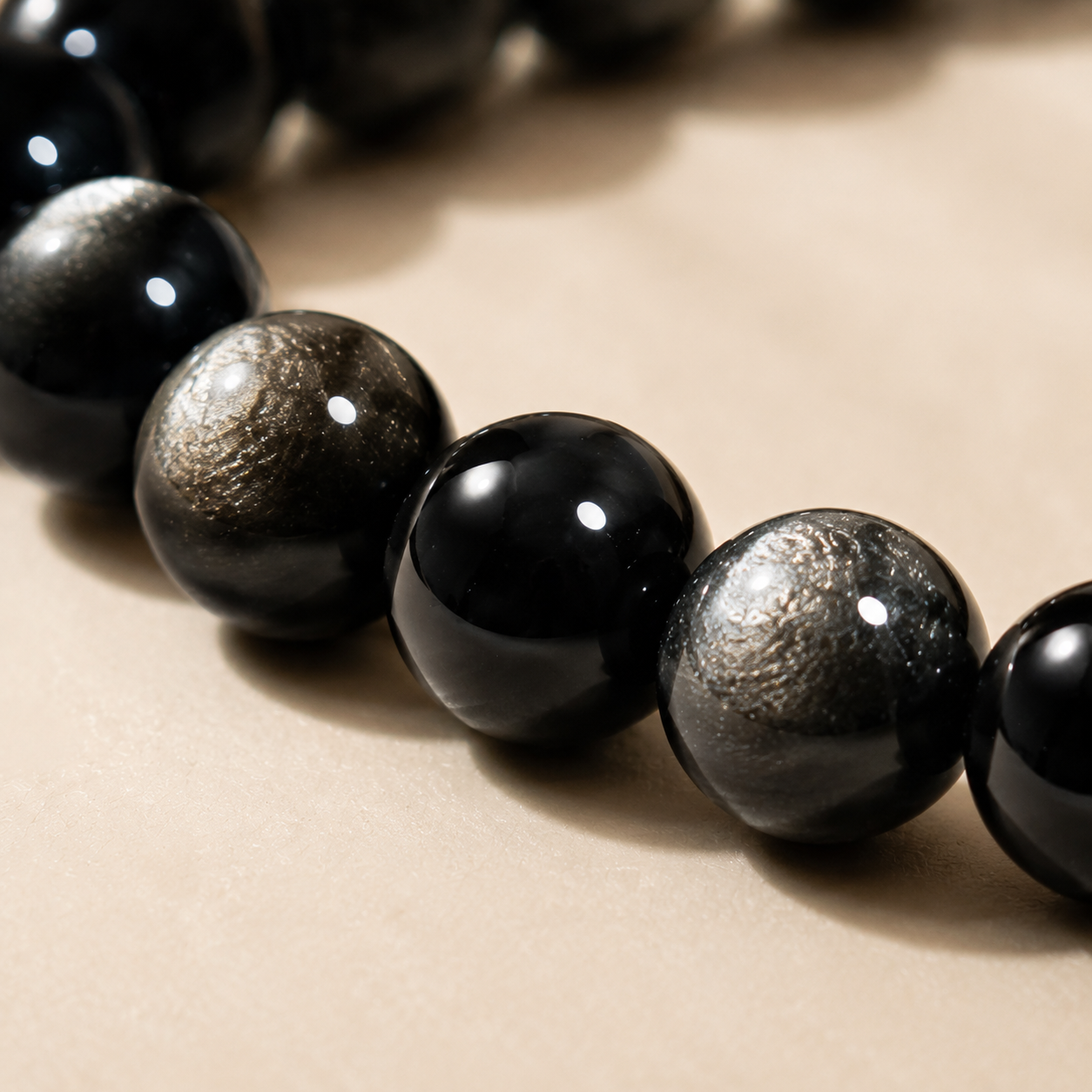 7A Silver Sheen Obsidian Bracelet – 8mm – bead texture macro detail