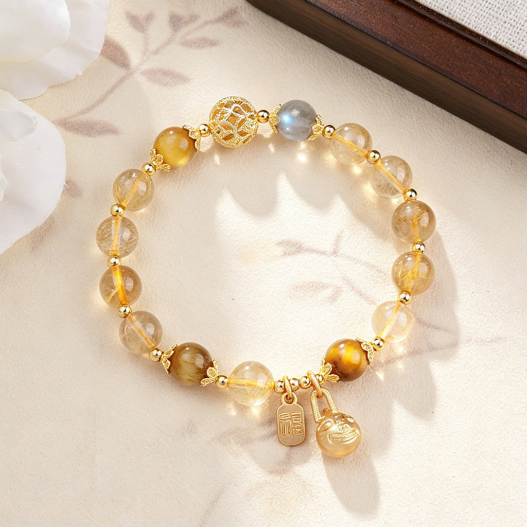 The Wealth Magnet: Golden Rutilated Quartz Pi Xiu Bracelet for Financial Success & Good Fortune