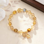 The Wealth Magnet: Golden Rutilated Quartz Pi Xiu Bracelet for Financial Success & Good Fortune
