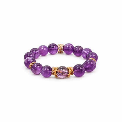 Natural amethyst bracelet with gold-tone accents on white