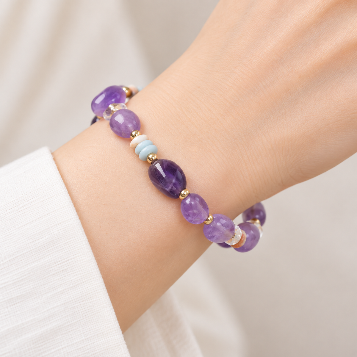 Close wrist view of the purple amethyst and Shoushan bracelet