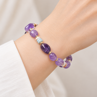 Close wrist view of the purple amethyst and Shoushan bracelet