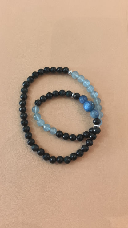 Aquamarine and obsidian double-wrap bracelet bead and design detail