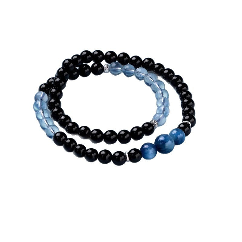 Aquamarine and obsidian double-wrap bracelet bead and design detail