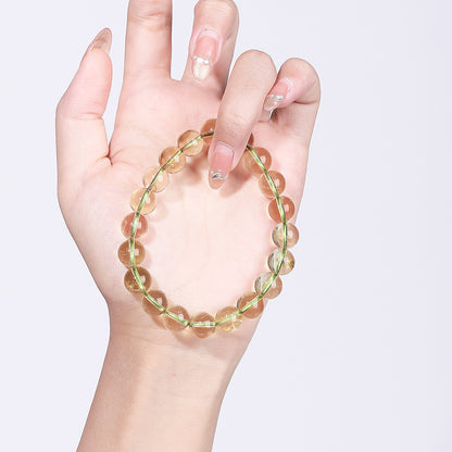 Bamboo green crystal bracelet photographed in hand