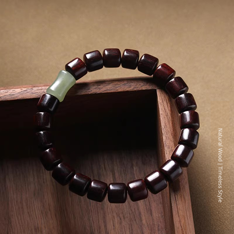 Polished wooden barrel beads on display box