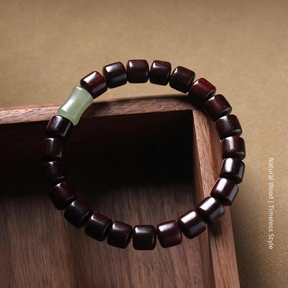 Polished wooden barrel beads on display box
