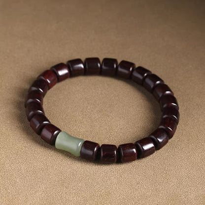 Red sandalwood bracelet low-angle detail