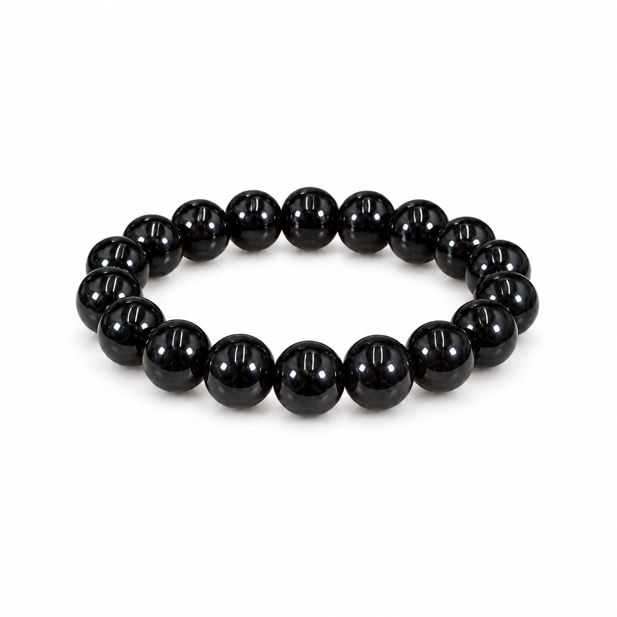 Polished black tourmaline bead bracelet on white