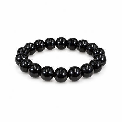 Polished black tourmaline bead bracelet on white