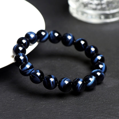 Blue tiger eye bracelet at an angled view