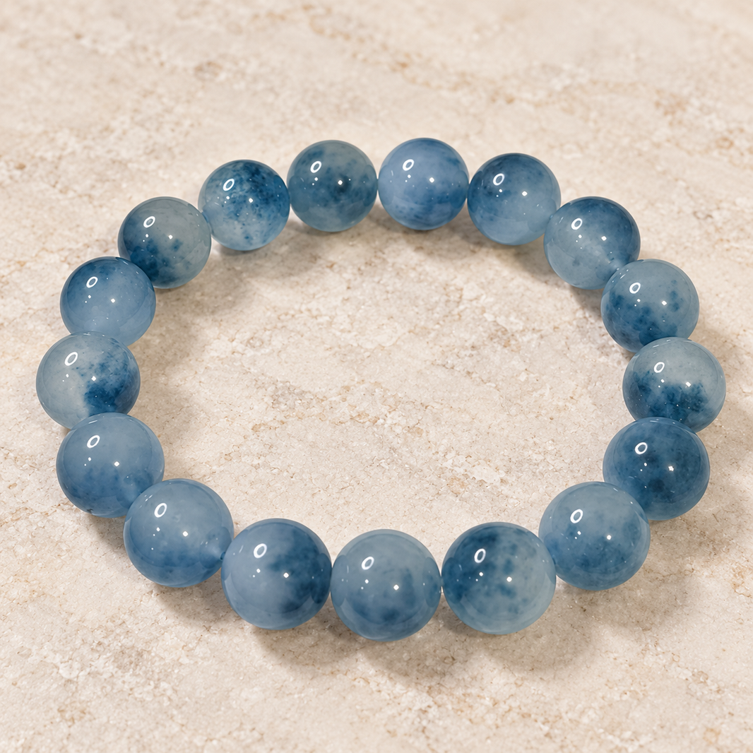 Icy blue water jadeite blue inclusions bracelet — full bracelet material detail