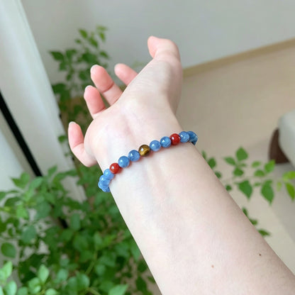 Blue kyanite bracelet worn on a wrist