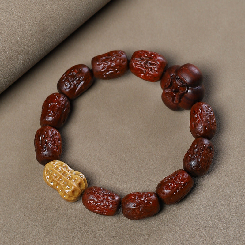 Full carved wood bracelet with jujube-shaped beads and peanut and persimmon accents