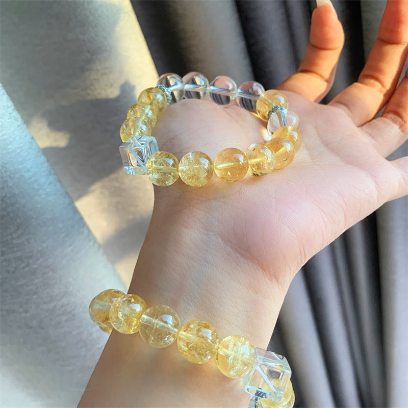 Citrine cube bead bracelet shown held and worn
