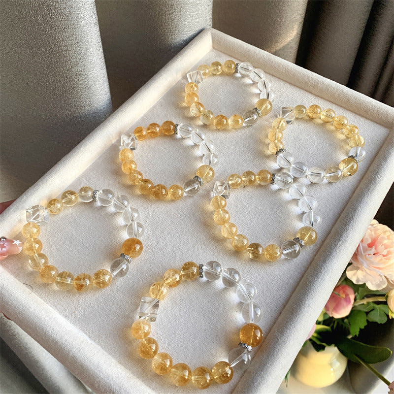 Citrine and clear quartz bracelets showing natural color variations