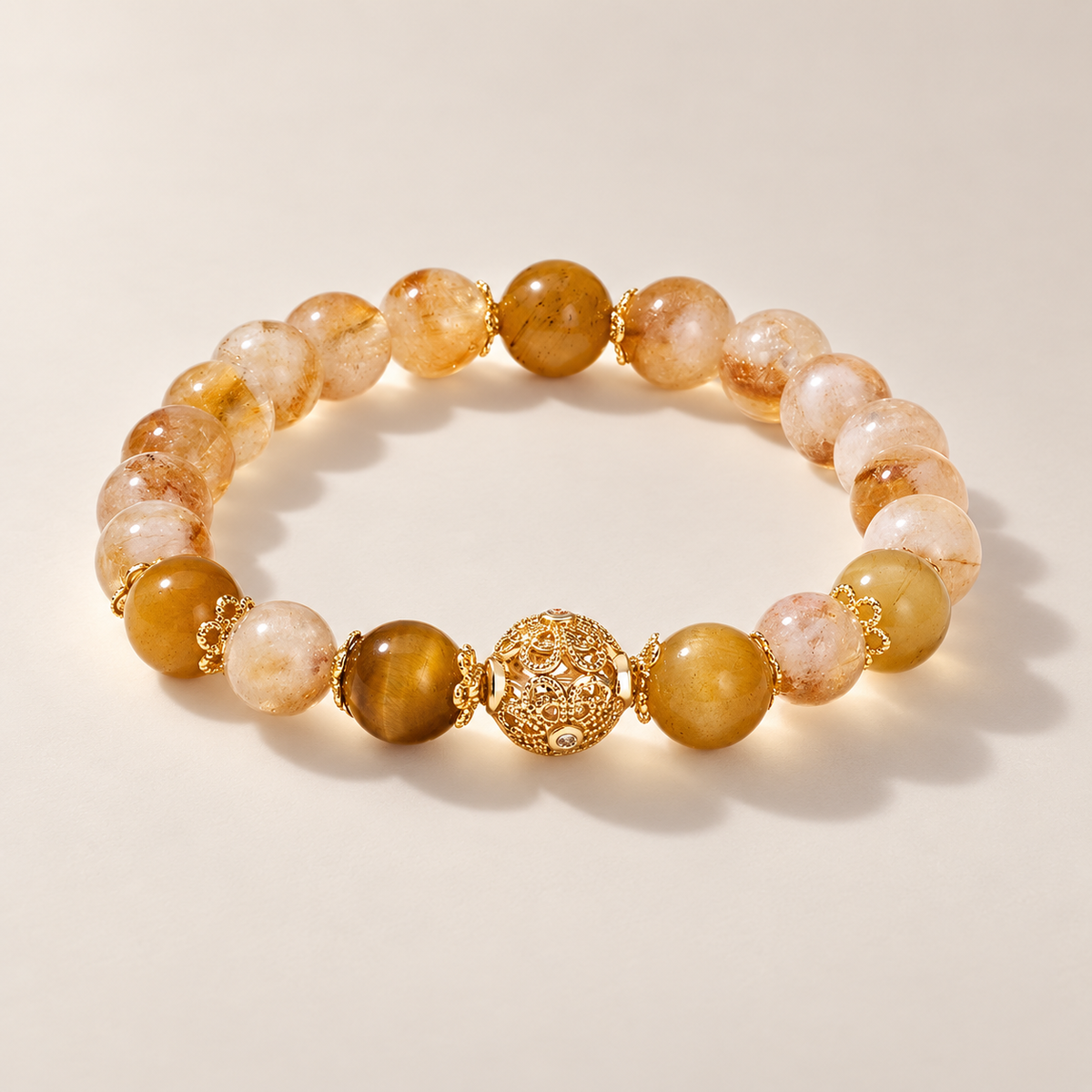 Three-quarter view of citrine and tiger eye bracelet