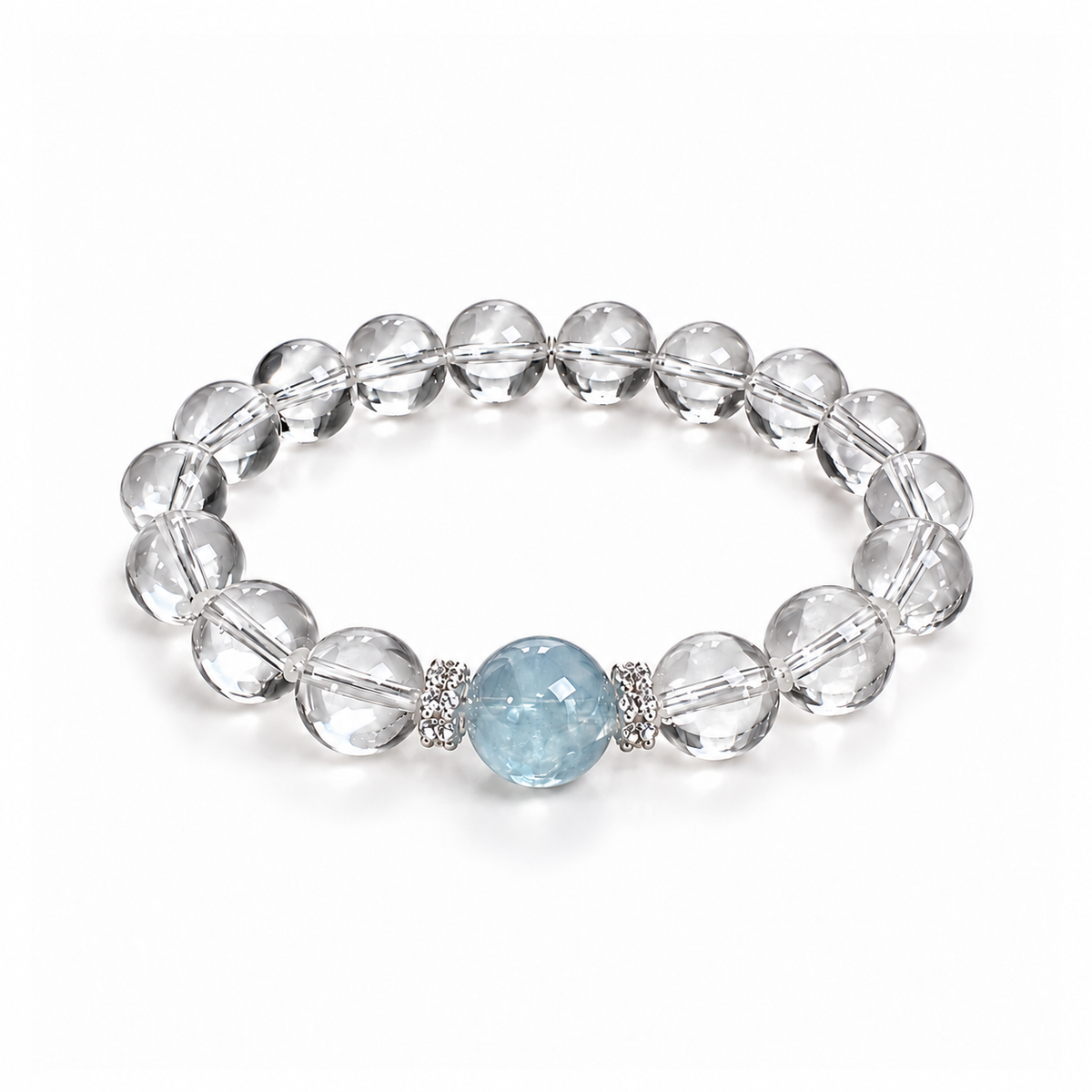 Colorless clear quartz and blue aquamarine bead bracelet on white