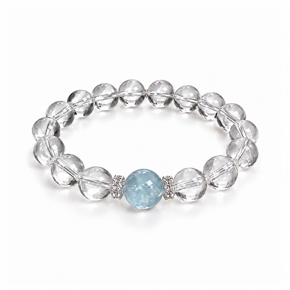 Colorless clear quartz and blue aquamarine bead bracelet on white