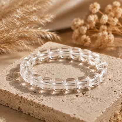 7A Clear Quartz Barrel Bead Bracelet – travertine and dried-flower still life