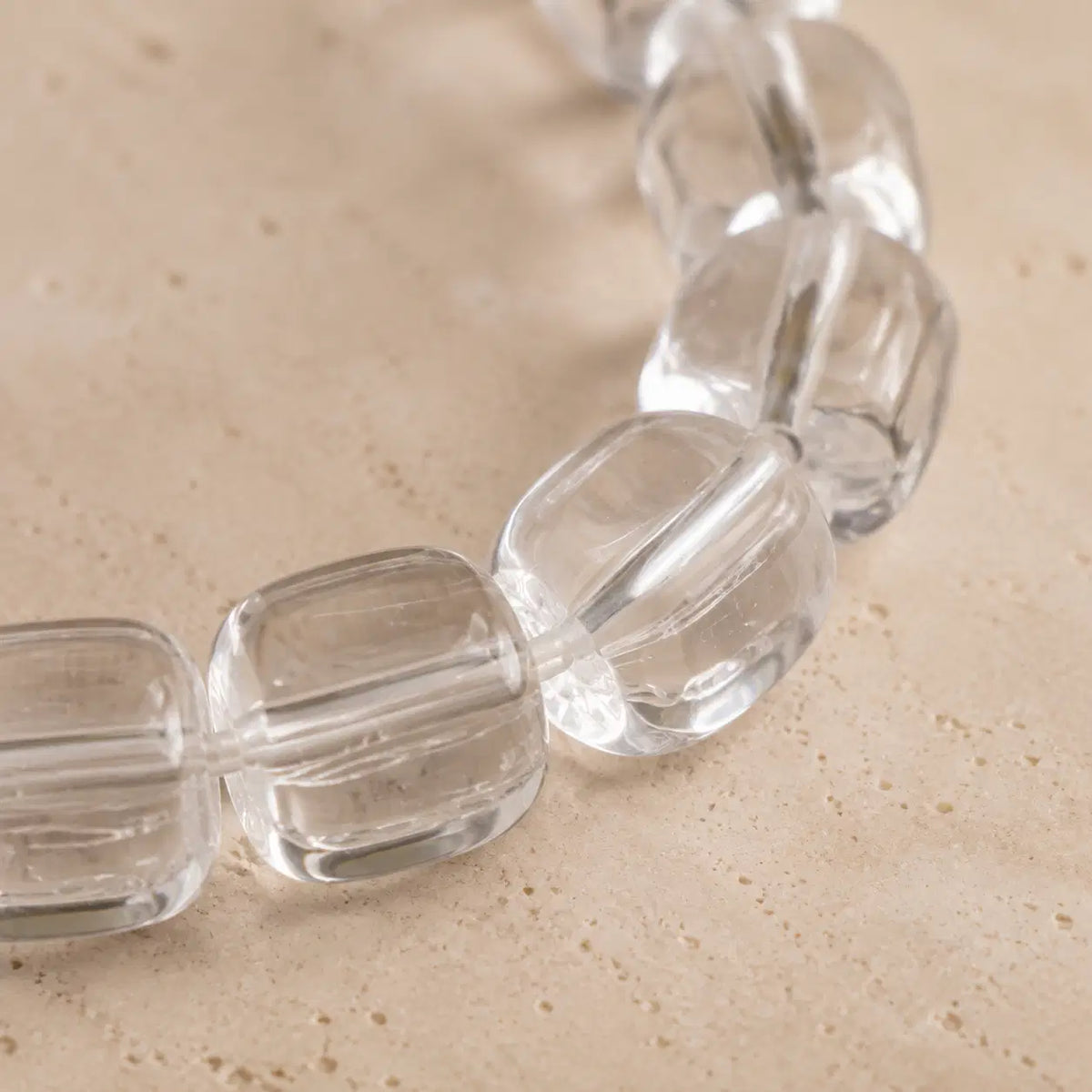 7A Clear Quartz Barrel Bead Bracelet – bead texture macro detail