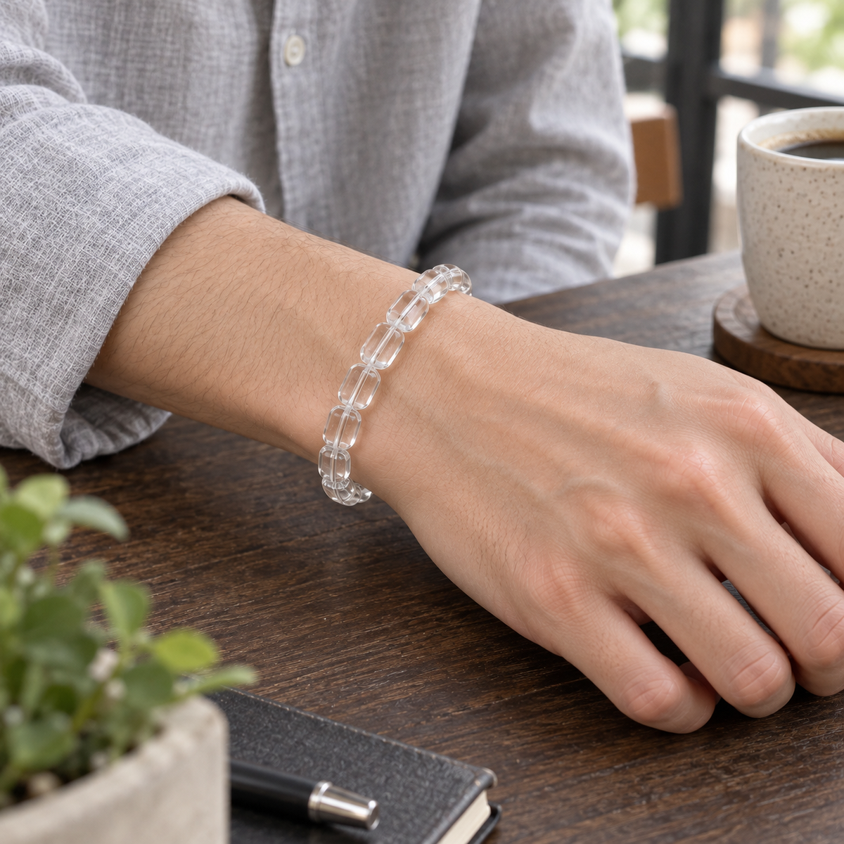 7A Clear Quartz Barrel Bead Bracelet – café lifestyle wrist view
