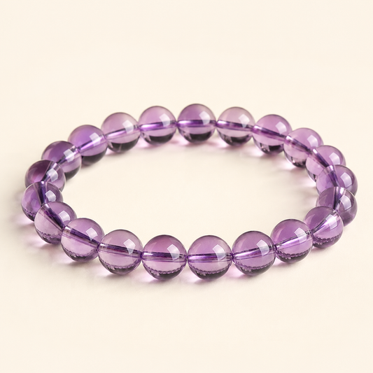Natural light amethyst bracelet on a warm cream background