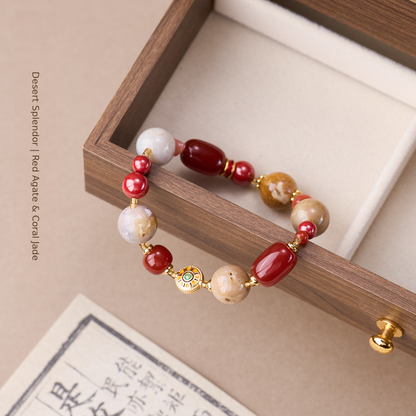 Red agate bracelet showing coral jade patterns and gold-tone spacers