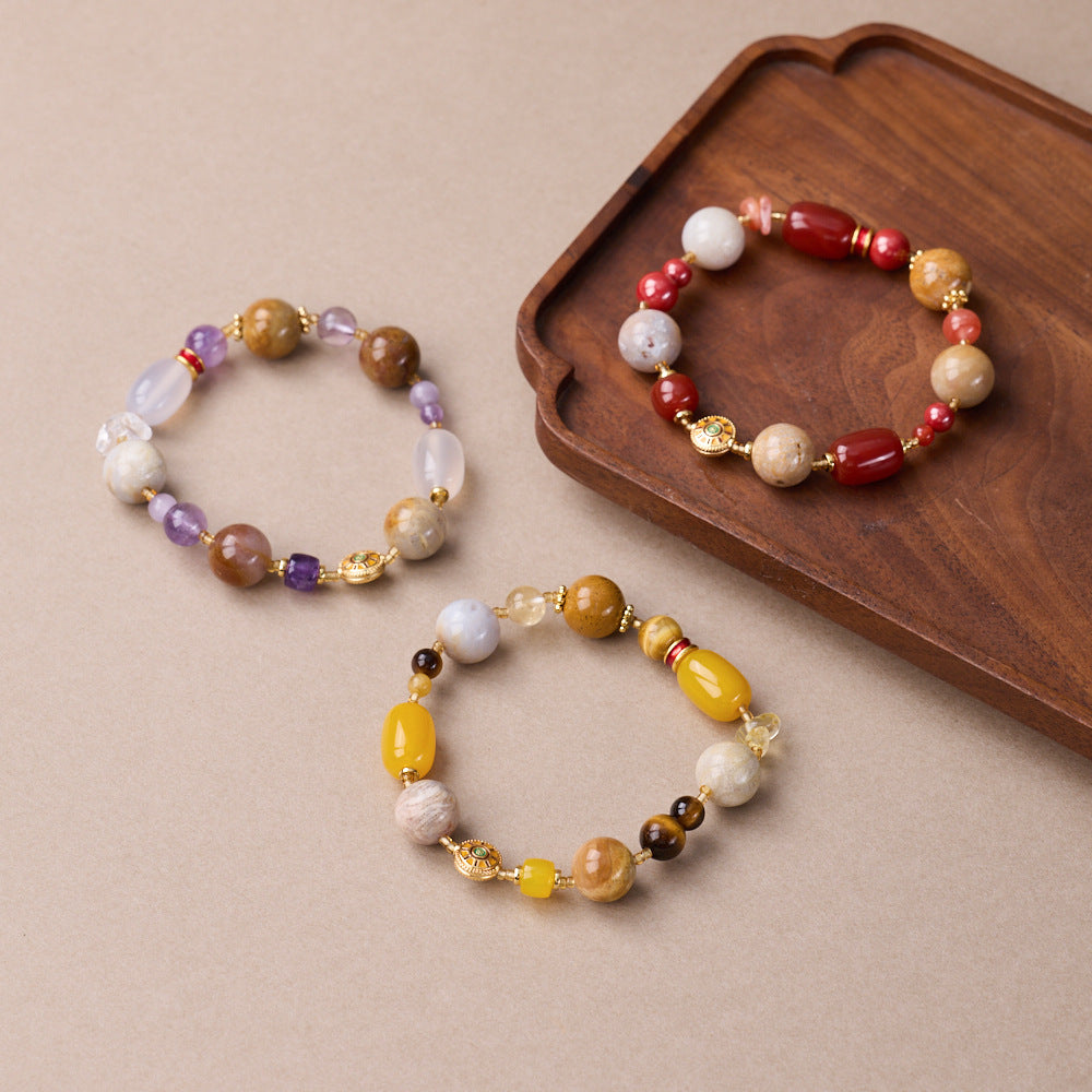 Three Dunhuang color bracelet styles displayed together