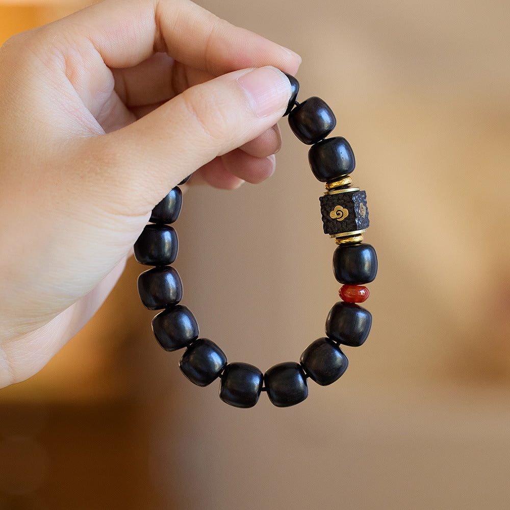 Close view of cloud centerpiece with a red accent bead