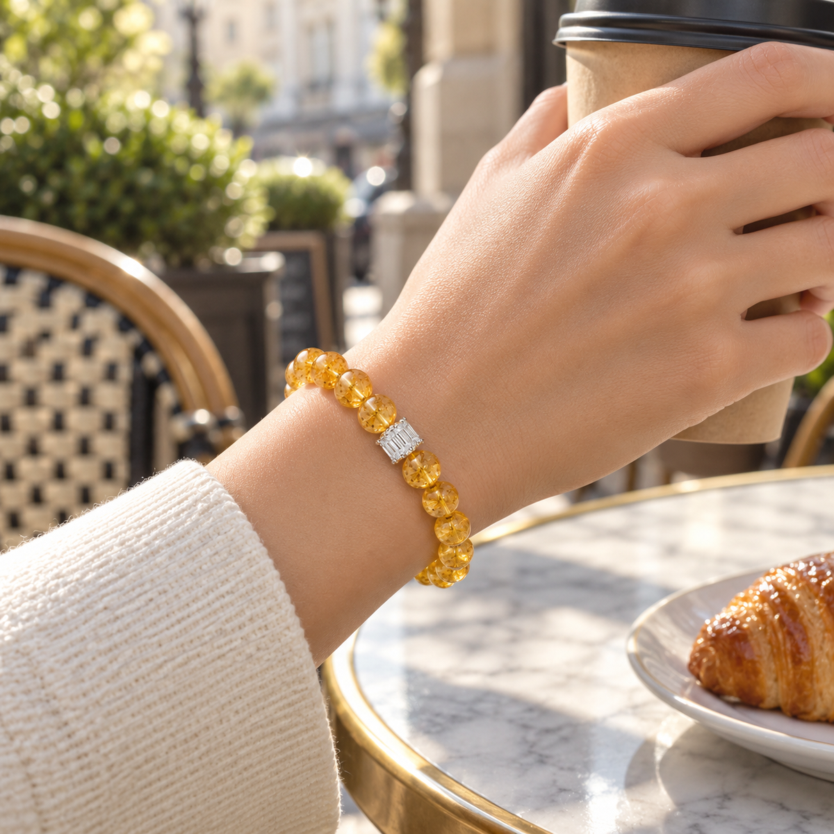 Natural citrine bracelet 10mm — wearing view, café