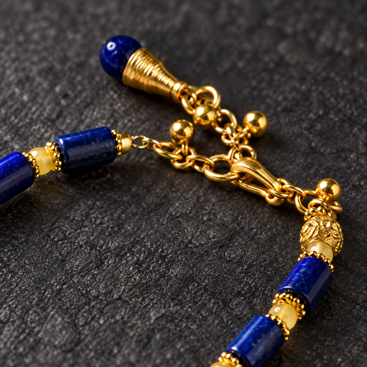 Close-up of bracelet clasp and blue beads