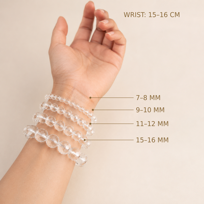 Faceted Clear Quartz – bead size comparison on a 15–16 cm wrist