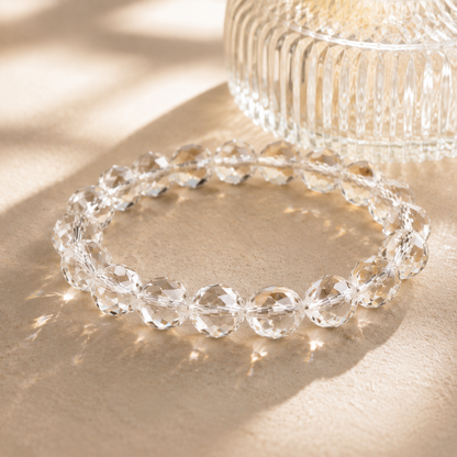 Natural Clear Quartz Faceted Bracelet – diagonal glass-bottle still life