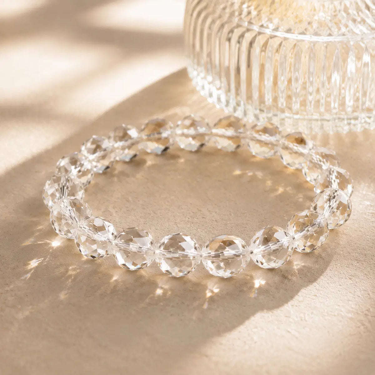 Natural Clear Quartz Faceted Bracelet – diagonal glass-bottle still life