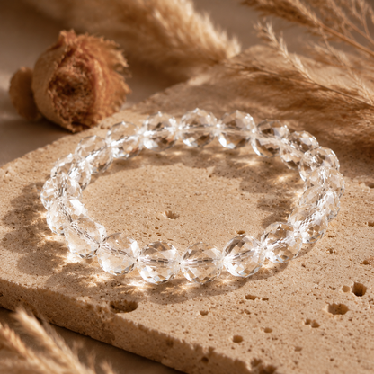 Natural Clear Quartz Faceted Bracelet – travertine and dried-flower still life