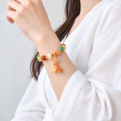 Faceted Golden Silk Jade (Jinsi Yu) multicolor bead bracelet side standing wear