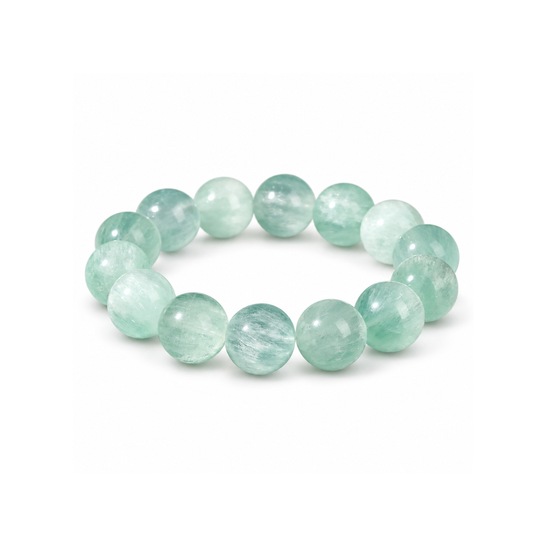 Mint green round bead bracelet on a white background