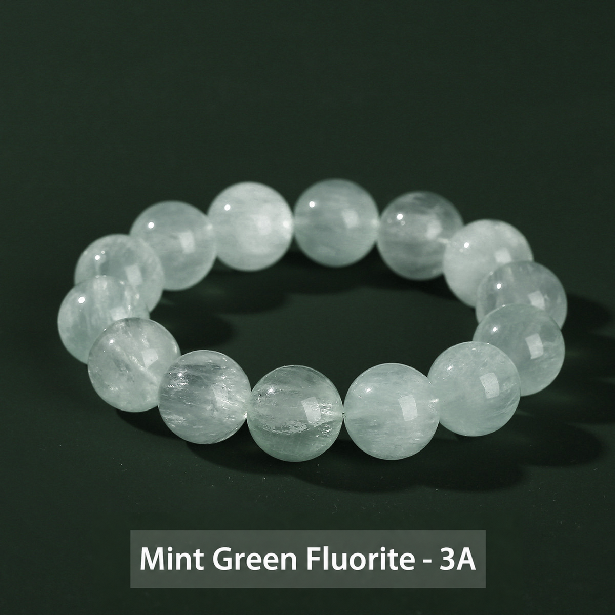 Round bead bracelet showing its polished surface and internal patterns