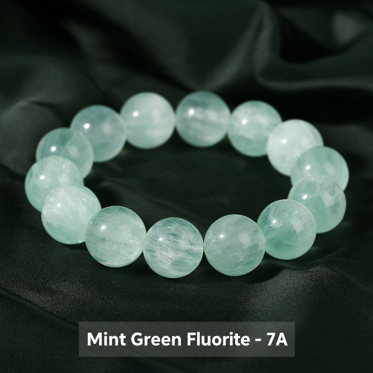 Round bead bracelet showing its polished surface and internal patterns